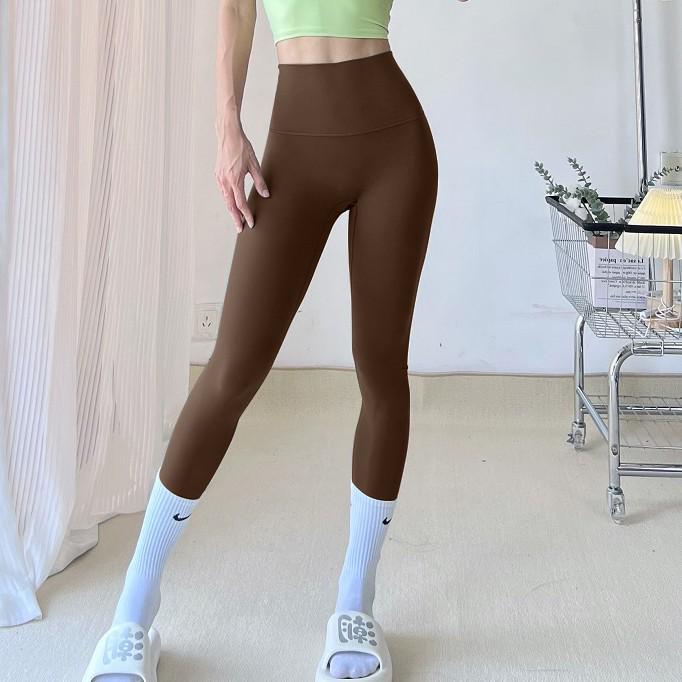 Seamless Zero-Feel Yoga Pants: High-Waisted, Bare-Skin Comfort, Back Pocket, Peach Butt Lift, Tight-Fit for Running and Fitness.