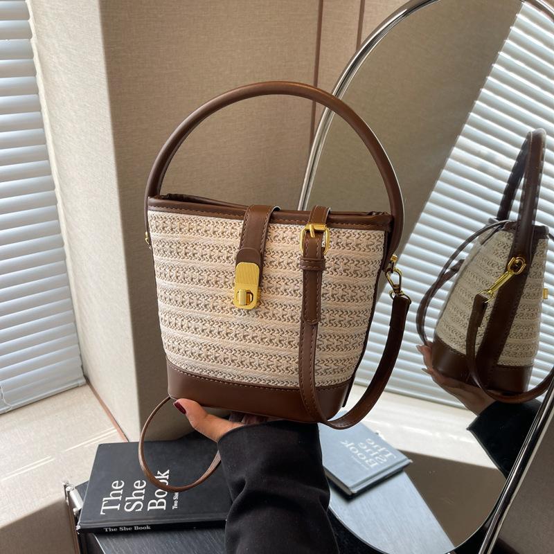 Tragbare kontrastierende gewebte Tasche Damenmode Bucket Bag Nische schlichte lässige Textur Umhängetasche