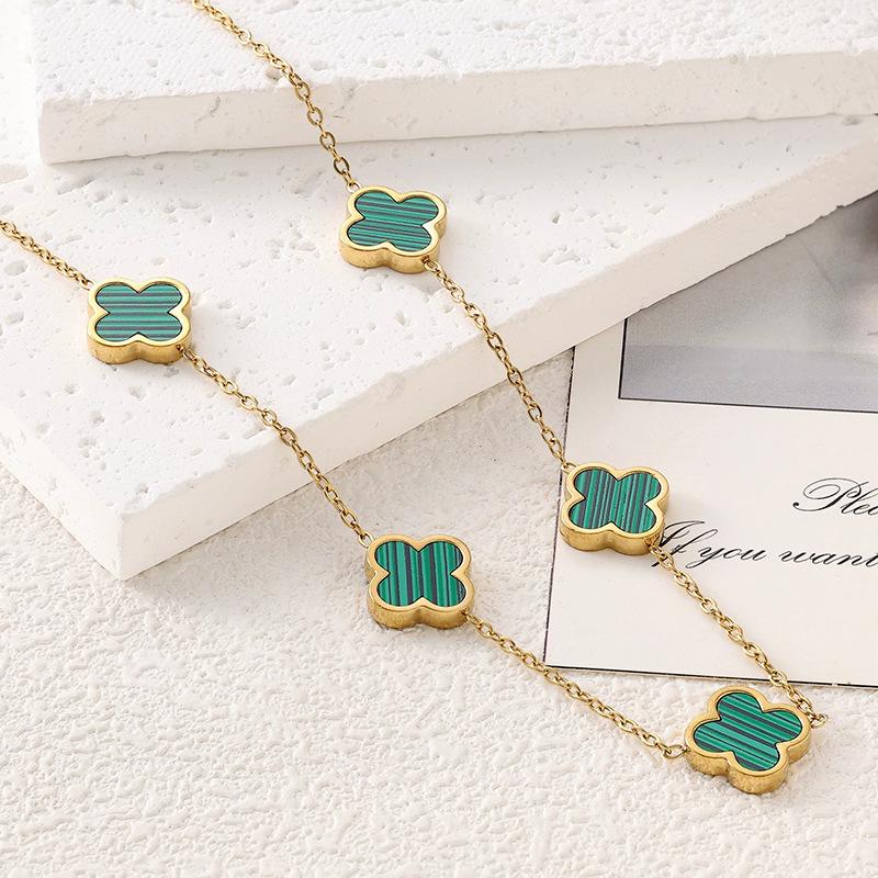 Titanium Steel Four-Leaf Clover Jewelry Set: Bracelet, Necklace & Earrings.