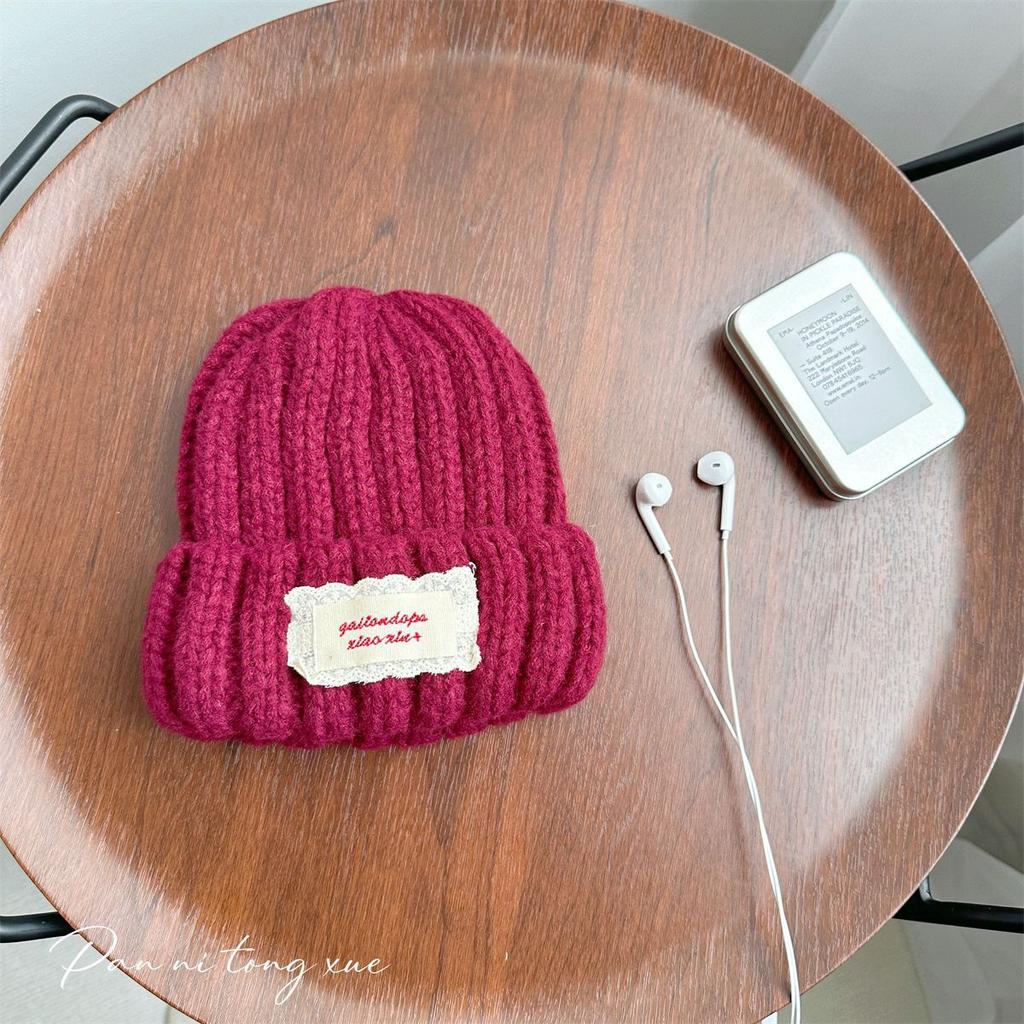 Neue Spitze Etikett Kinder Wollmütze Nuojiji Student Herbst und Winter Neu Warm und Vielseitig Ohrenschutz Strickmütze