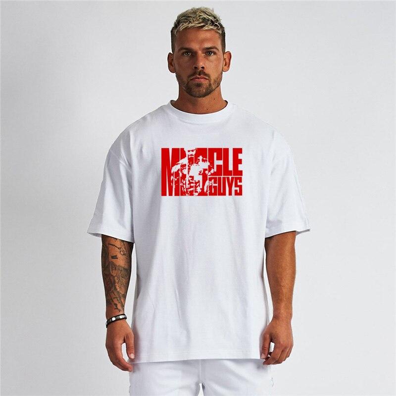 Muscleguys Men's Gym Clothes Loose Comfortable Black Short Sleeve T-Shirt Summer Bodybuilding Half Sleeve Trend Streetwear