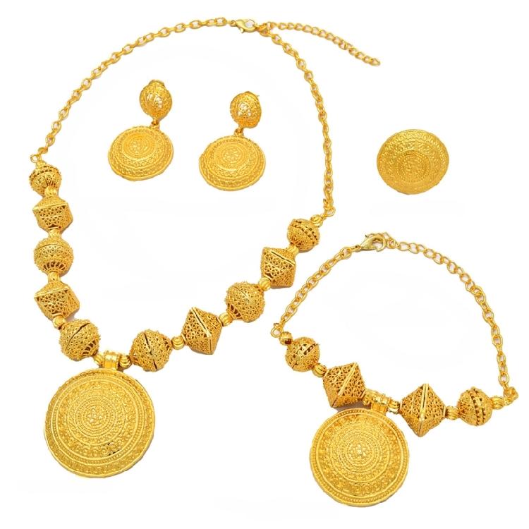 Роскошный набор украшений золотого тона для женщин: колье, серьги, браслет и кольца. Для торжеств.