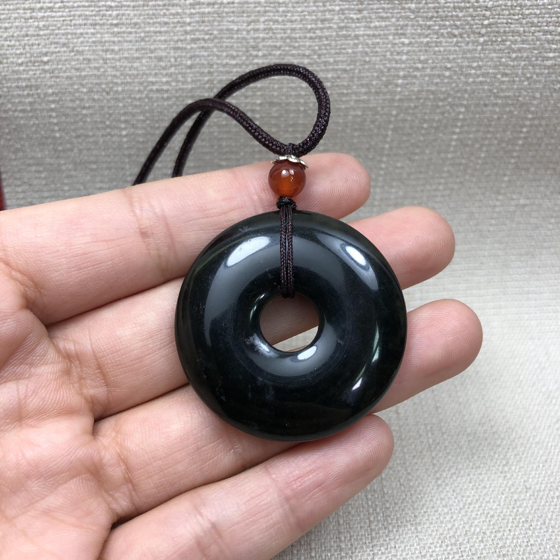 

Translucent Green Tibetan Jade Peace Buckle Pendant with Magnetic Black Jade and Dark Green Serpentine Jade. Pendant