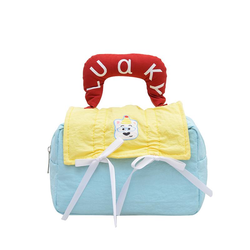 

Dopamine splicing cosmetic bag large capacity portable travel handbag cute cartoon partition cosmetic storage bag синій