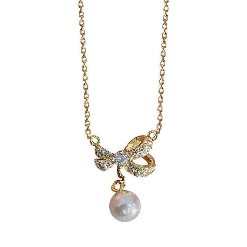 Collier de perles à nœud papillon, design de niche doux, chaîne de clavicule sensée, collier de super fée de tempérament