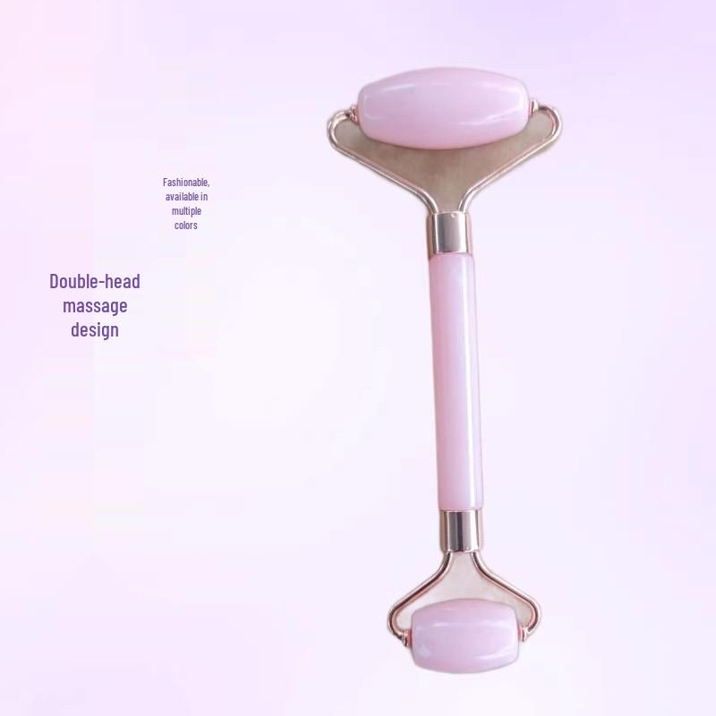 Heart-Shaped Rose Quartz Facial Roller & Gua Sha Massager for Skin Lifting and Muscle Relaxation.