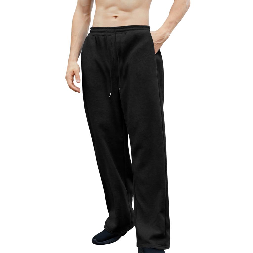 Pánské tepláky s elastickým pasem, rovný a široký střih, volný střih, s kapsami v pase.