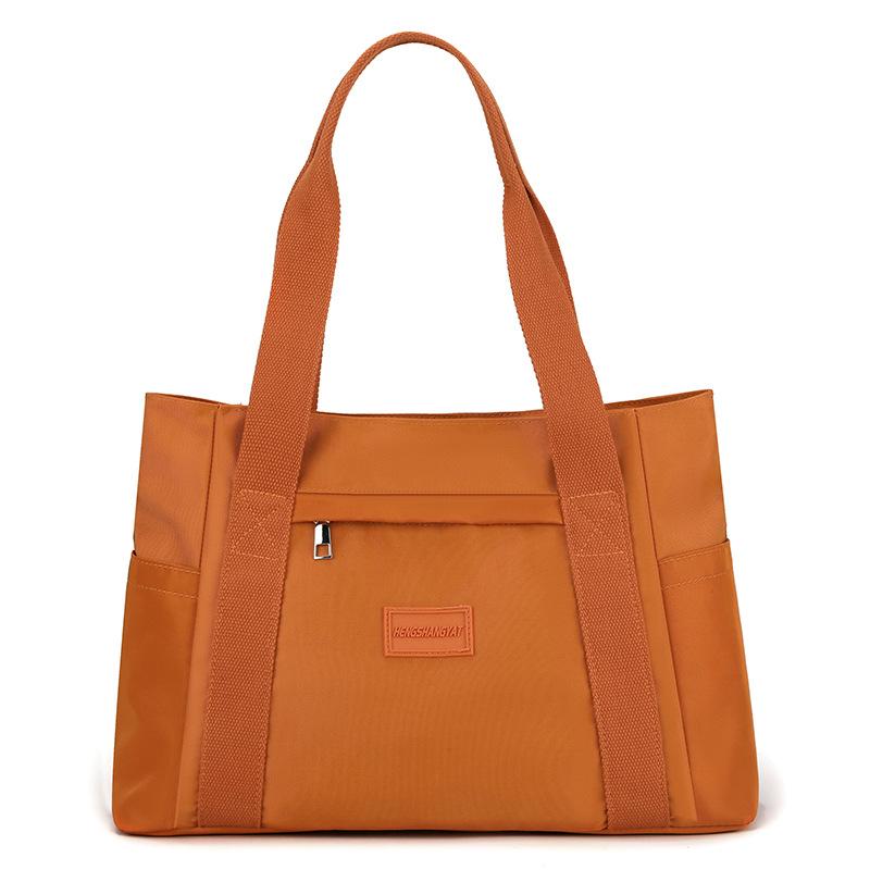 

Nylon Fabric Fashion Minimalist Shoulder Bag New Casual Lightweight Handheld Tote Bag помаранчевий