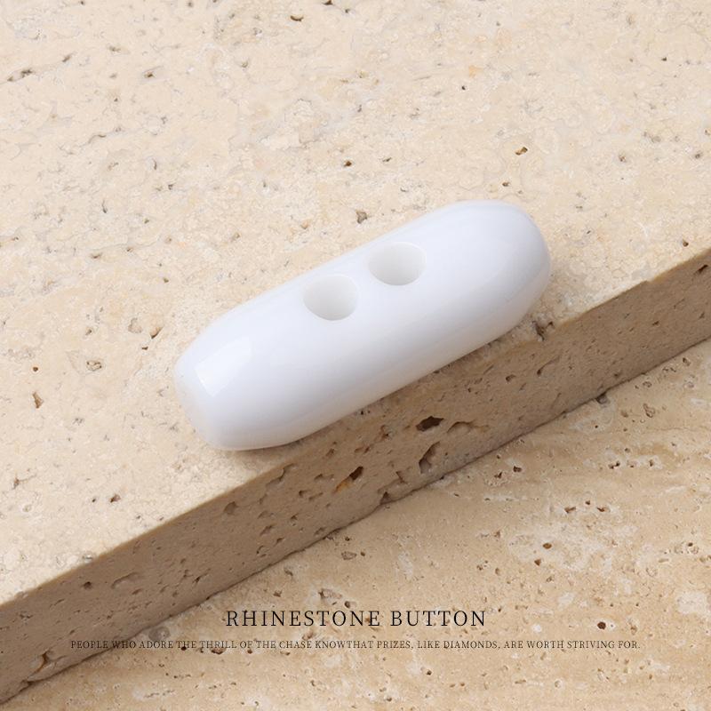 

Черно-белая смоляная пряжка из оливкового дерева, пальто-тренч, пара пряжек, пуховик, хлопковая куртка, роговая пряжка, пуговица White 3cm