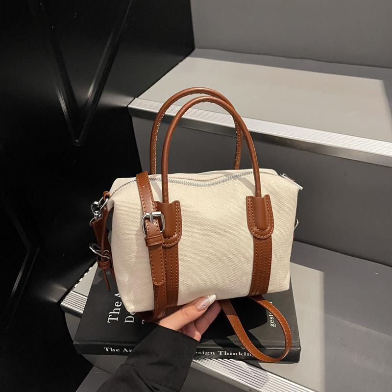 Classic Canvas Duffel Bag with Leather Trim and Adjustable Strap Perfect for Travel and Everyday Use