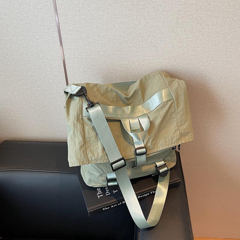 

New roll-up women s bag backpack cloth bag folding rollable oblique backpack large-capacity college student schoolbag зелёный