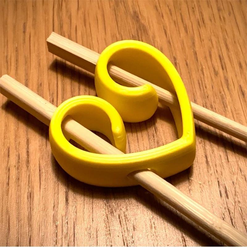 1-5 Stück Herzförmige Wiederverwendbare Essstäbchen-Helfer für Erwachsene Kinder Essstäbchen-Trainingshilfe Rutschfester Sushi-Essstäbchen-Scharnierverbinder