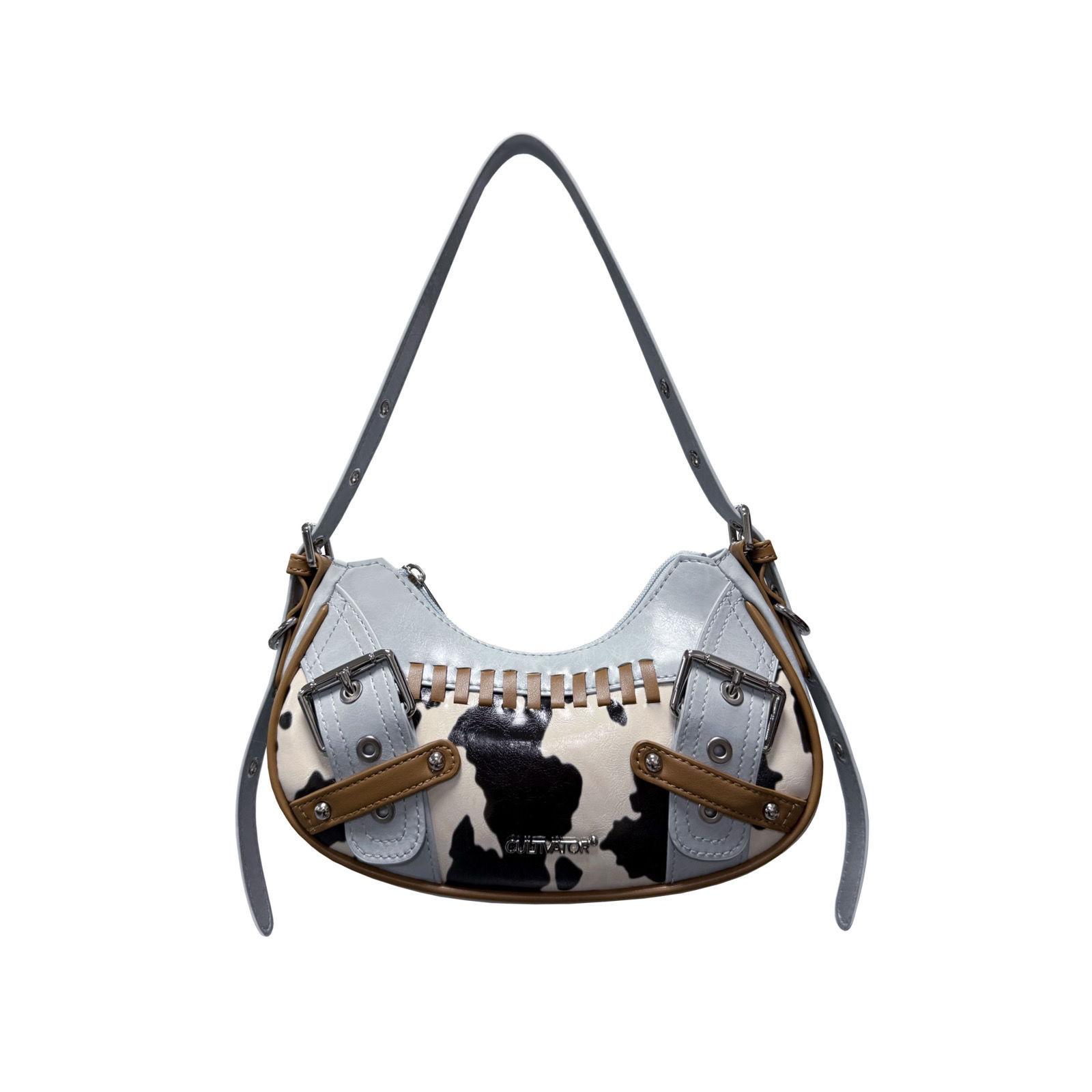 Нишевый дизайн универсальная ретро контрастная цветовая комбинация коровья расцветка сумка под мышку 2025 новая модная плечевая сумка-багет женская