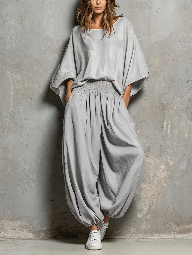 European and American women's clothing 2026 autumn and winter new fashion casual round neck loose top wide leg pants two-piece set