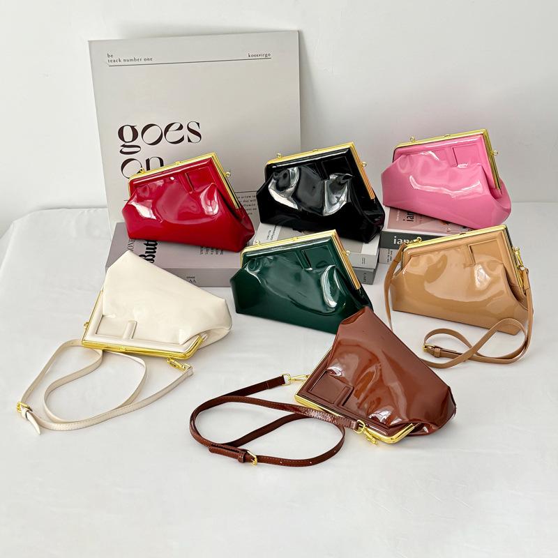 Metal clip bag women's autumn new European and American retro fashion glossy shoulder crossbody triangle bag