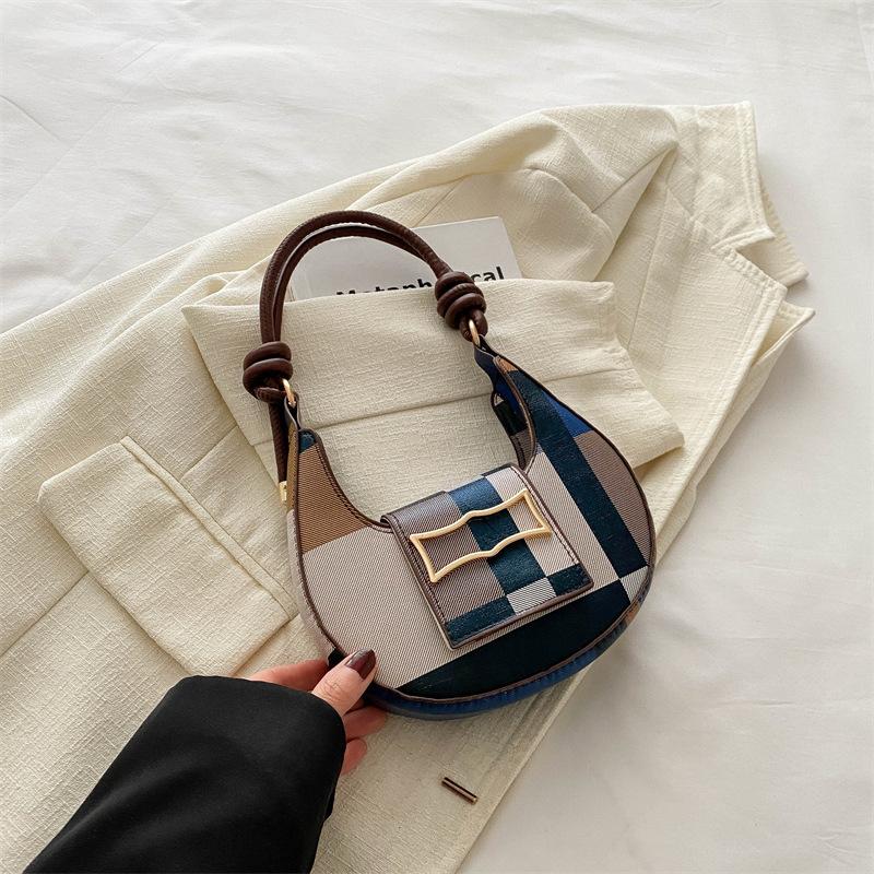 

Popular fashion armpit bag 2025 spring and summer new shoulder handbag Korean version retro Internet celebrity dumpling bag texture women разноцветный