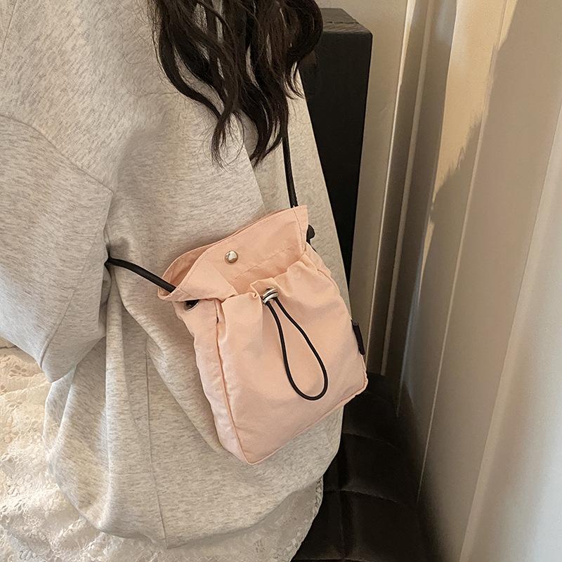 Minimalist Sports Style Mobile Bag for Women 2026 New Drawstring Canvas Small Bag Versatile Mini Crossbody Bag Coin Purse