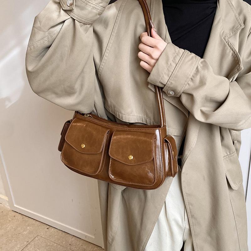 Niche High-End Sense Multi-Pocket Locomotive Bag Temperament Shoulder Armpit Bag Commuter Messenger Baguette Bag