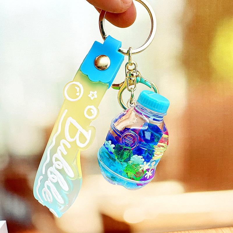 Cartoon Colorful Quicksand Bottle Keychain Student Backpack Keychain Oil Liquid Acrylic Floating Doll Pendant