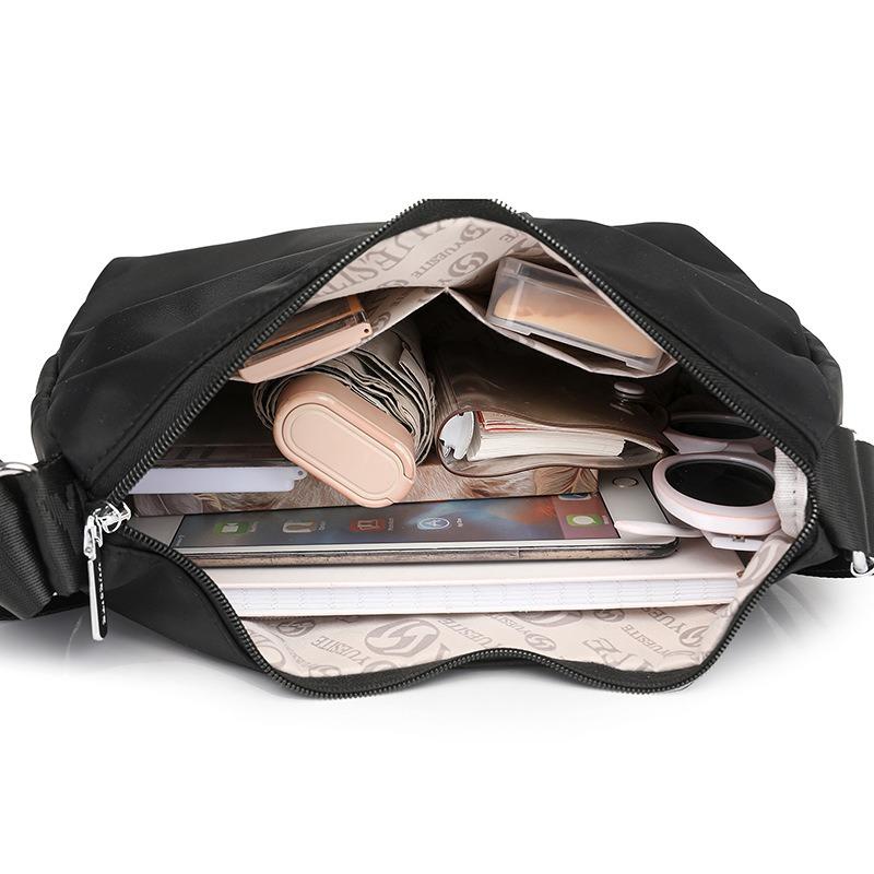 Einfacher und großzügiger Schulterrucksack Vielseitige, spritzwassergeschützte Nylontasche mit großem Fassungsvermögen Modetrend schräg getragener Damenrucksack