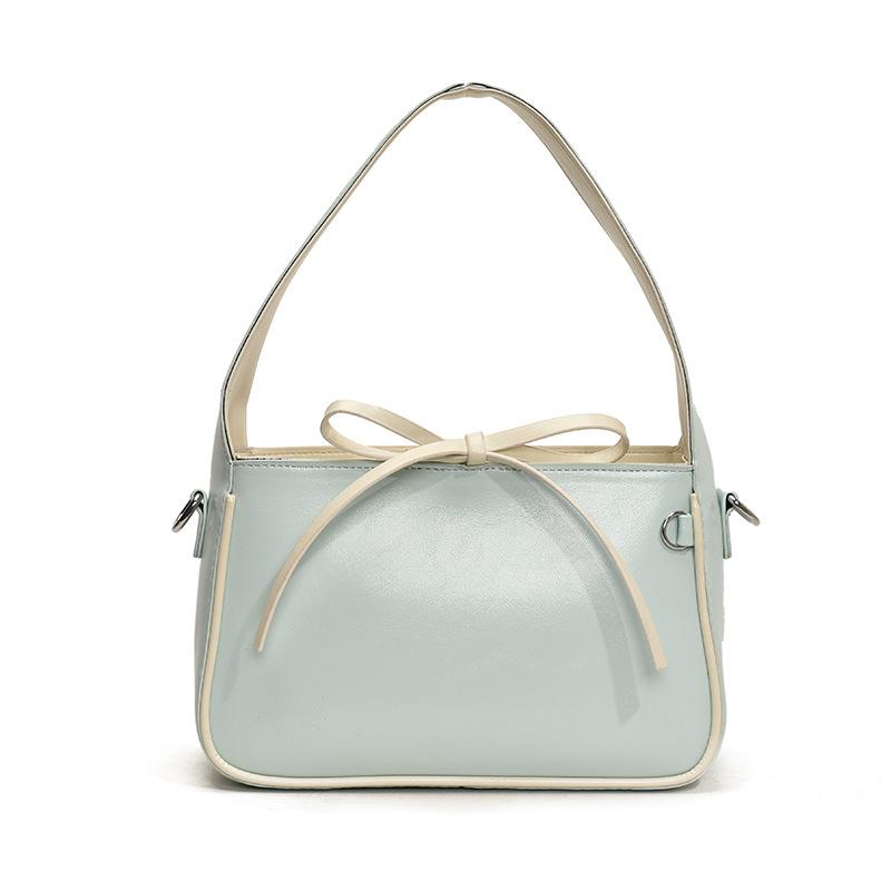 

Spring popular Korean version ins simple contrasting color portable bucket bag fashionable patent leather small fresh shoulder messenger bag women