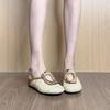 Niche personality design sense straw woven holiday wind bag head shoes women's rear strap hollow wedge half slippers