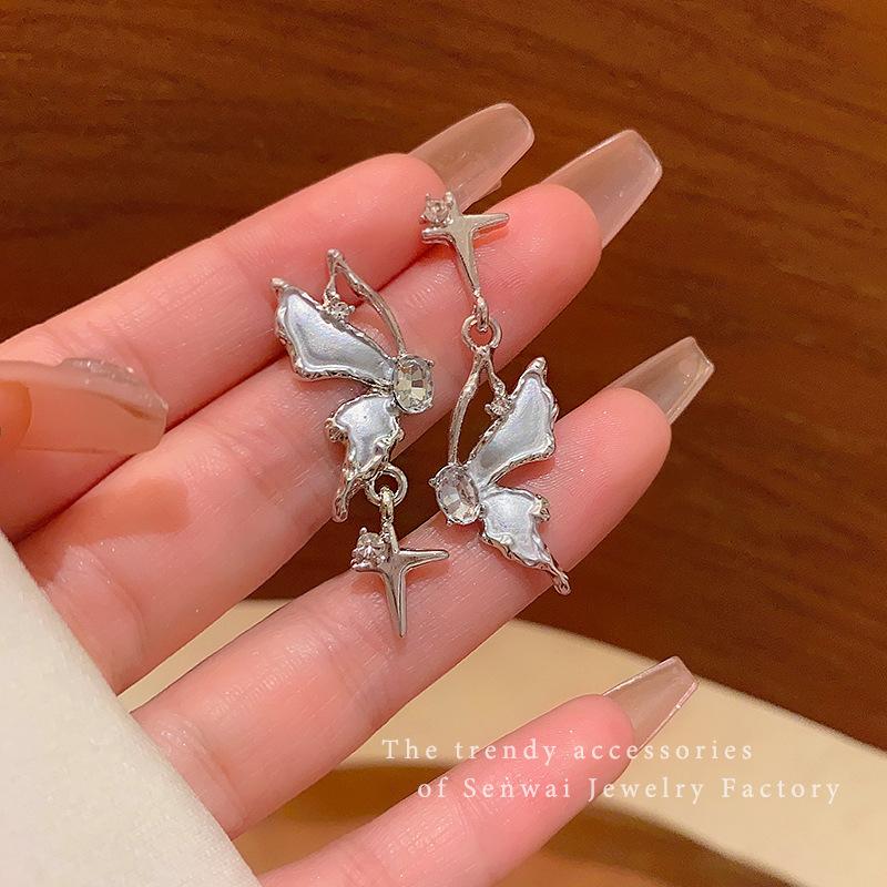

Flash diamond asymmetrical butterfly earrings women s high sense niche design stud earrings light luxury ears