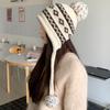 Japanese and Korean women's geometric jacquard wool hat winter windproof and cold protection ear protection lanyard sleeve hat