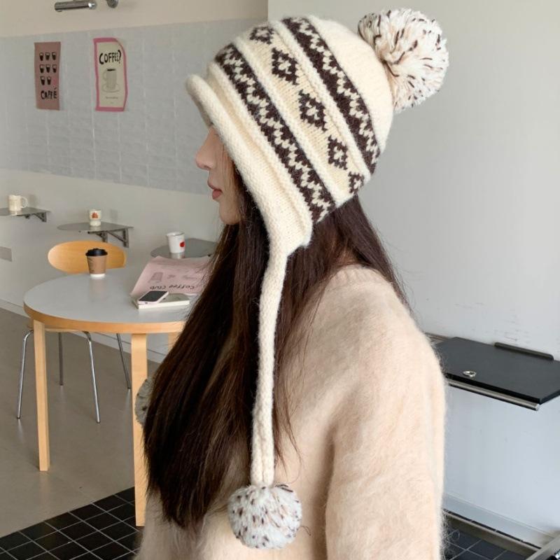 Japanese and Korean women's geometric jacquard wool hat winter windproof and cold protection ear protection lanyard sleeve hat