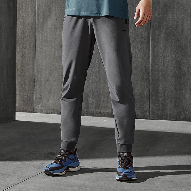Li Ning Training Series Solid Color Breathable Sweat-Wicking Tapered Knit Sports Pants Men Pants Dark-Black AYKS535-2