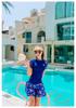 Women's Short-Sleeve Two-Piece Swimsuit: Slimming, Tummy-Covering; Ideal for Swimming, Hot Springs, Beach, or Surfing.