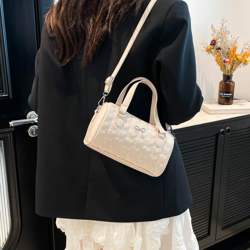 New summer popular casual and beautiful fresh solid color bow cylinder bag portable shoulder messenger bag women's bag
