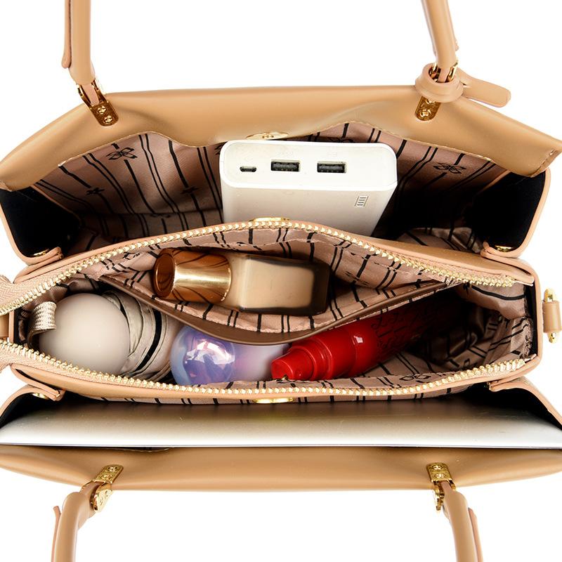 Neue minimalistische und vielseitige Damen-Handtasche mit großem Fassungsvermögen und hochwertigem Gefühl für den täglichen Weg zur Arbeit. Schultertasche kann schräg getragen werden