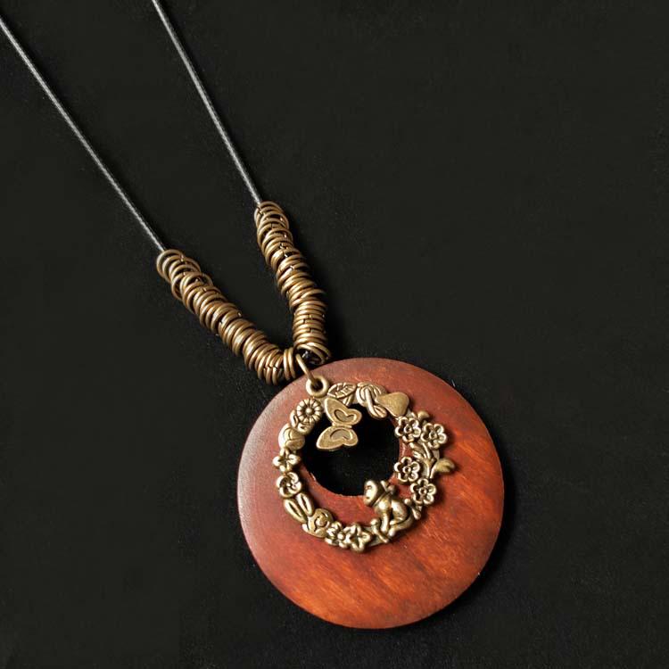 Ethnic Style Cotton-Linen Wooden Sweater Chain Necklace with Alloy Leaf Pendant