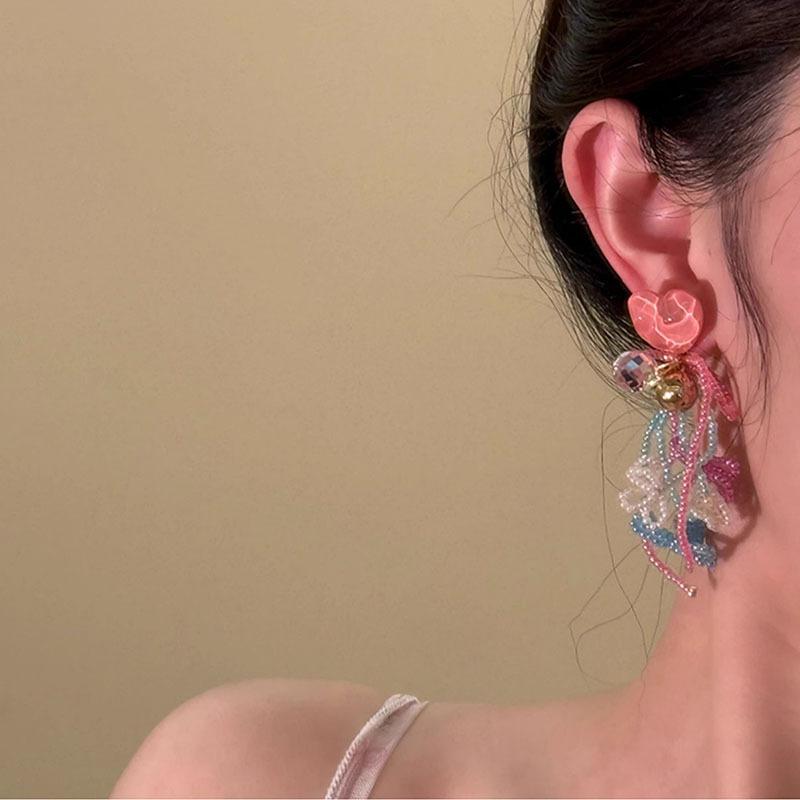 Resin glass rice bead bow fringed earrings fashion super fairy stud earrings light luxury high-end earrings