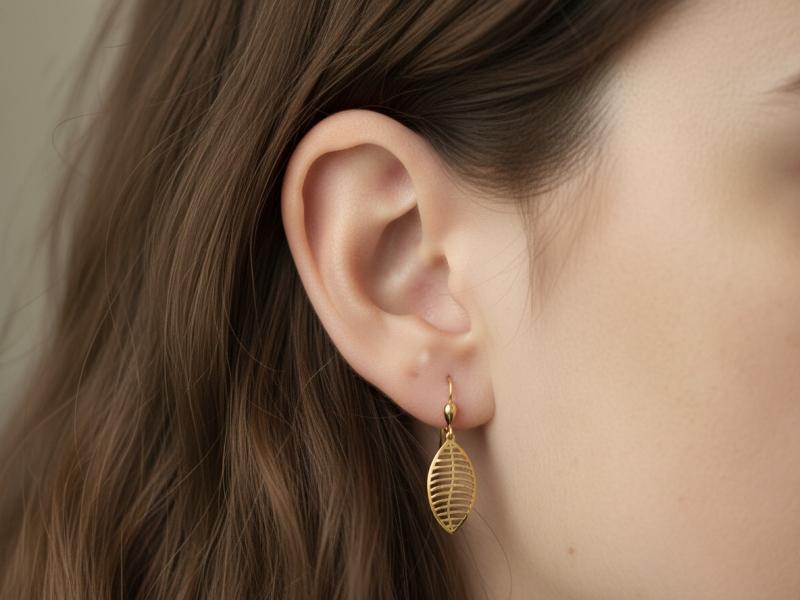 Gold hanging earrings 333 openwork leaf shape modern design for her