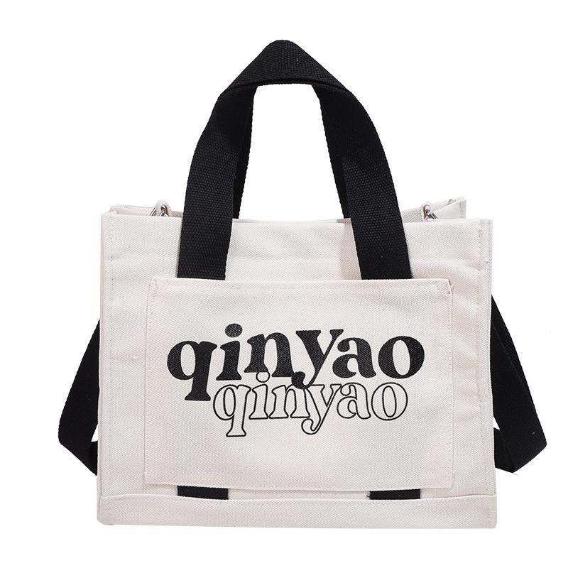 Tote bag niche new portable shoulder bag lazy women large capacity lightweight new versatile casual canvas backpack