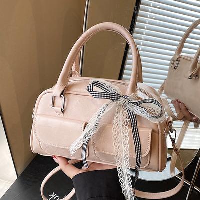 Frühling und Sommer neue Nische lässiger süßer Stil tragbare Boston Tasche hochwertig pendelt vielseitige Mode Umhängetasche