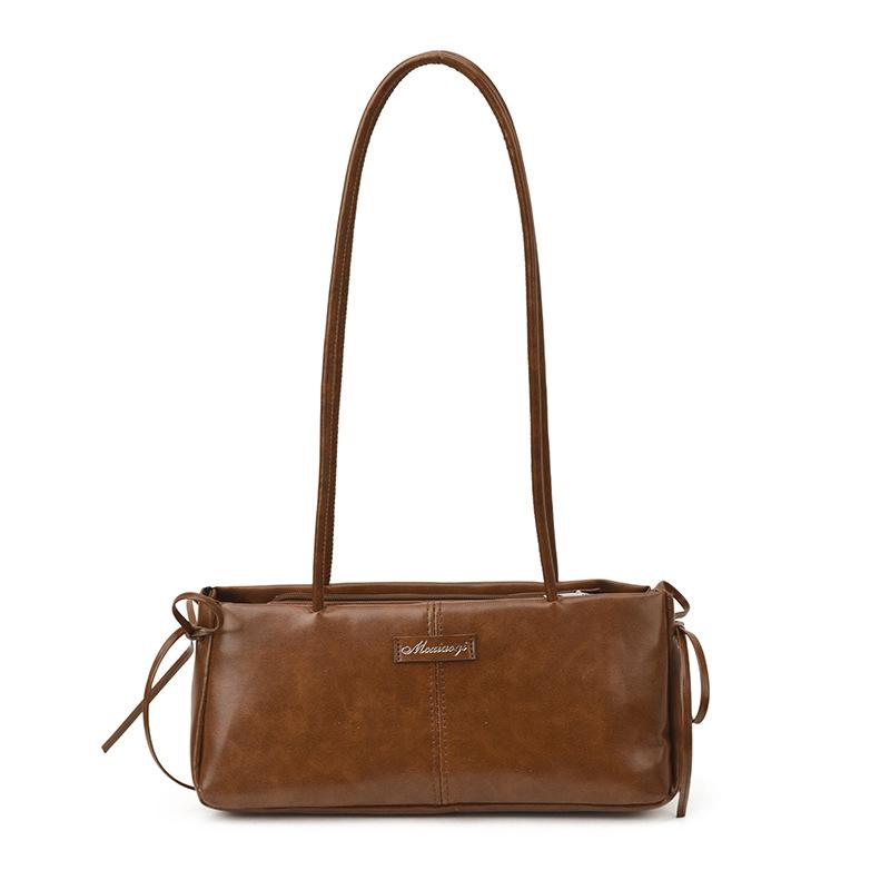 Commuter retro largecapacity tote bag, highend new women's shoulder bag, niche fashion underarm bag