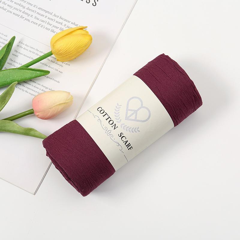 Autumn and winter new micro-elastic crumpled cotton blended long towel right angle lock edge polyester headscarf hot-selling solid color scarf