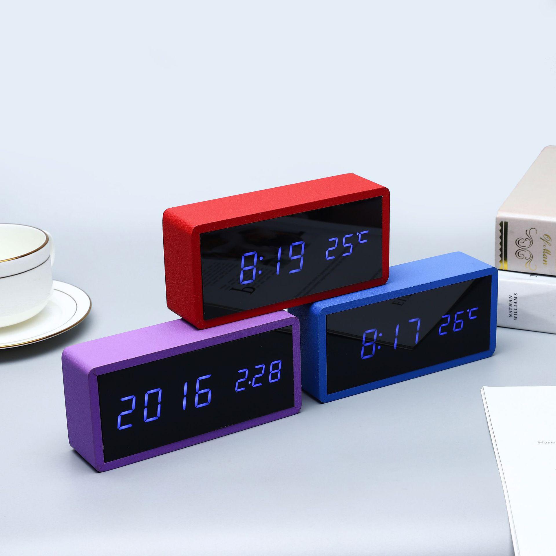

Multifunctional LED Bamboo & Wood Table Clock: Mirror Display, Alarm, Temperature & Humidity Sensor for Office & Bedside Use.