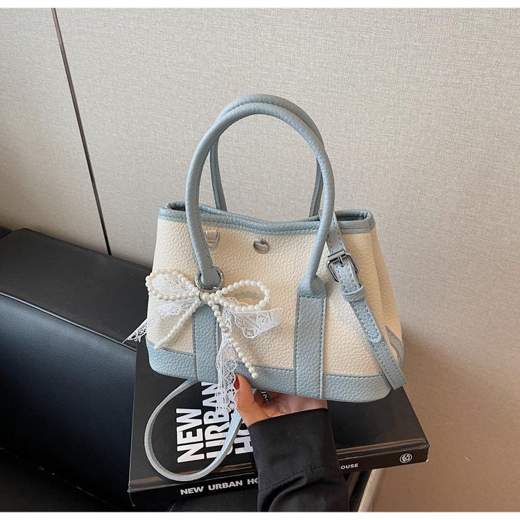 Niche design bags, new summer versatile messenger bags, popular portable bucket bags today