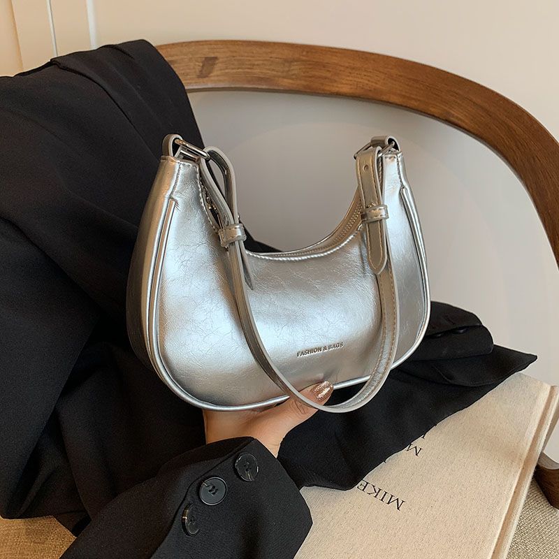 

Summer Silver Super Hot Underarm Bag Women s 2025 New Arrival Advanced Texture Light Luxury Minority Crossbody Crescent Women s Bag Silver