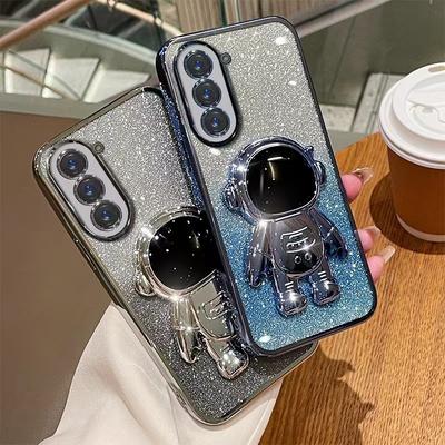 Astronaut Stand Suitable for Samsung S24ultra Mobile Phone Case S23Plus Gradient Flash Powder S22 Astronaut