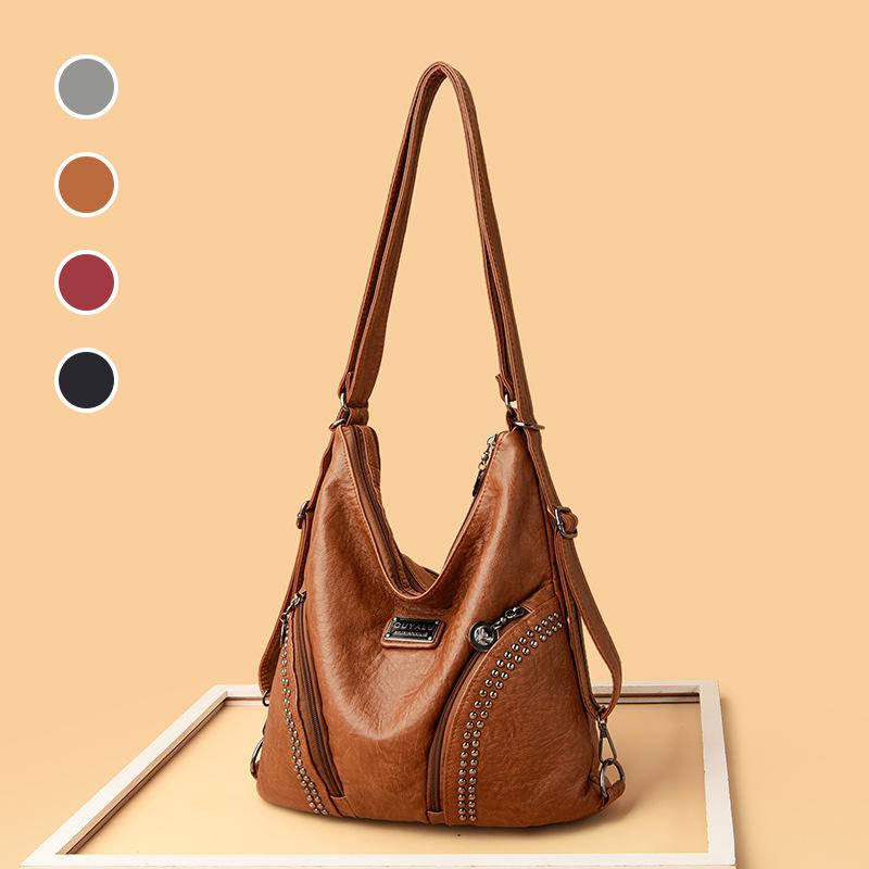 Retro soft leather locomotive bag New trendy rivet oblique span shoulder bag Spot quality women's bag
