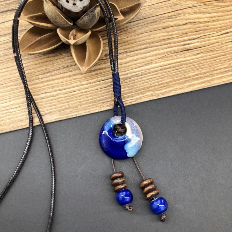 Retro literarische Baumwolle und Leinen Keramikkette, vielseitige lange Pulloverkette für Damen mit Quastenanhänger-Accessoires