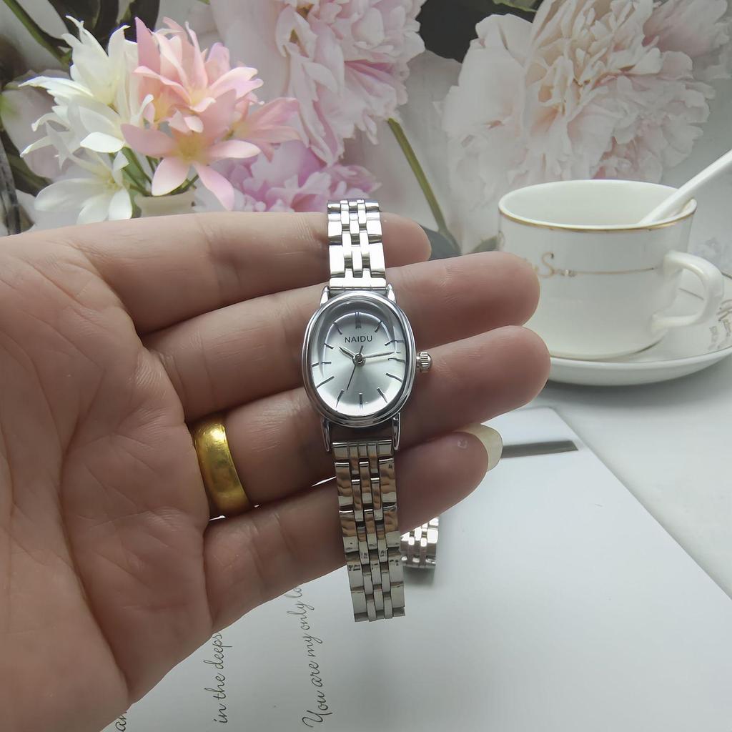 NAIDU Oval Dial Steel Band Women's Luxury Quartz Watch with Stick Markers