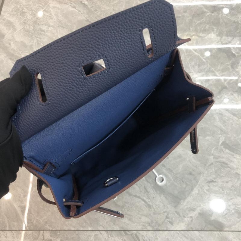 2025 New Leather Gender-neutral Men's and Women's Same First-layer Cowhide Round Lock Hole Breast Bag Single Shoulder  Leather Backpack