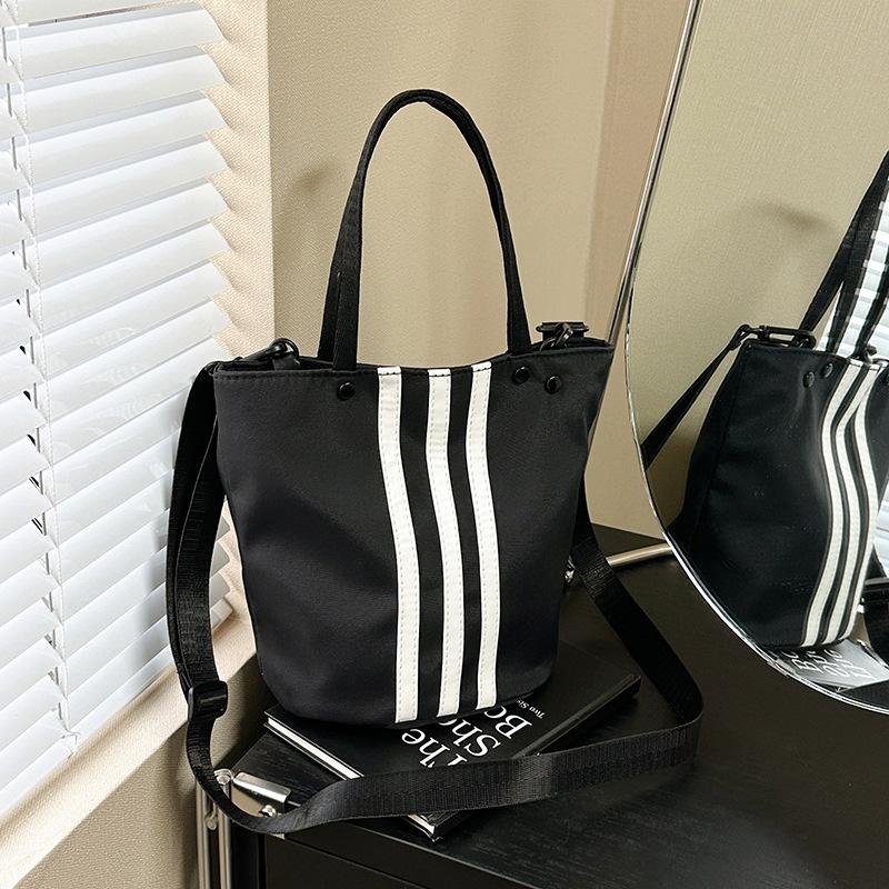 Hand-carrying Contrasting Striped Bucket Bag for Women's New Korean Style Niche Sports Commuter Shoulder Bag Versatile Crossbody Bag