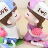 "Kissing Couple Resin Figurines: Cute Hanging Feet Decorative Ornaments for Living Room or Bedroom"